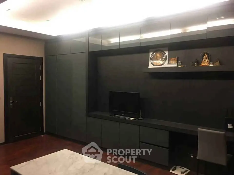 Modern study room with sleek cabinetry and built-in desk, perfect for productivity.