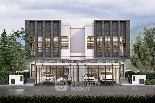 Modern duplex with sleek facade and spacious garage in serene neighborhood.