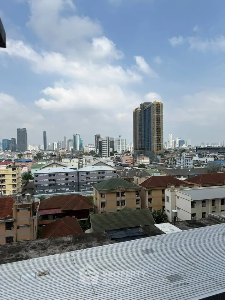 Stunning cityscape view showcasing a vibrant urban skyline with high-rise buildings under a clear blue sky.