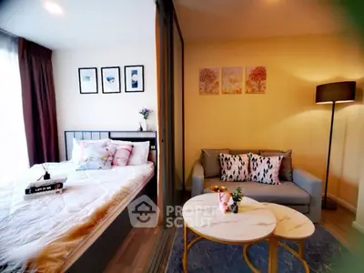 Cozy bedroom with stylish decor and inviting seating area