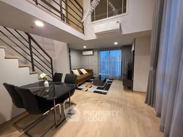 Modern duplex living room with stylish decor and open layout