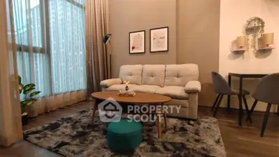 Stylish modern living room with cozy sofa and chic decor in high-rise apartment.