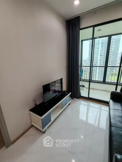 Modern living room with balcony view in high-rise apartment