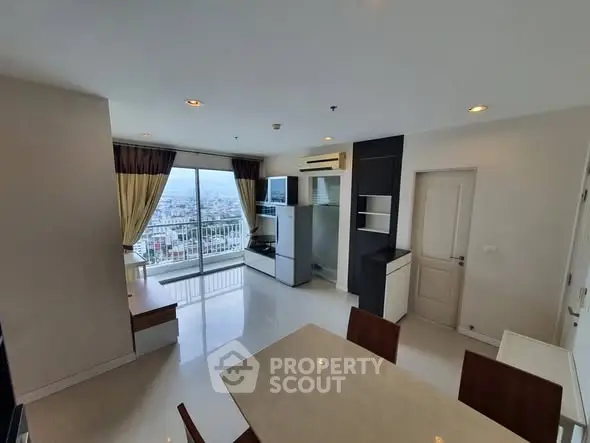 Spacious modern living room with city view and elegant decor