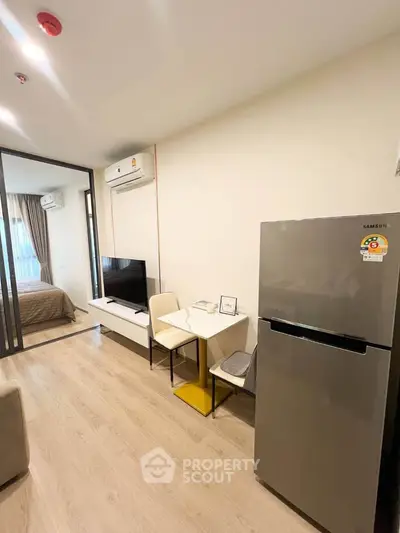 Modern apartment interior with open layout and sleek appliances