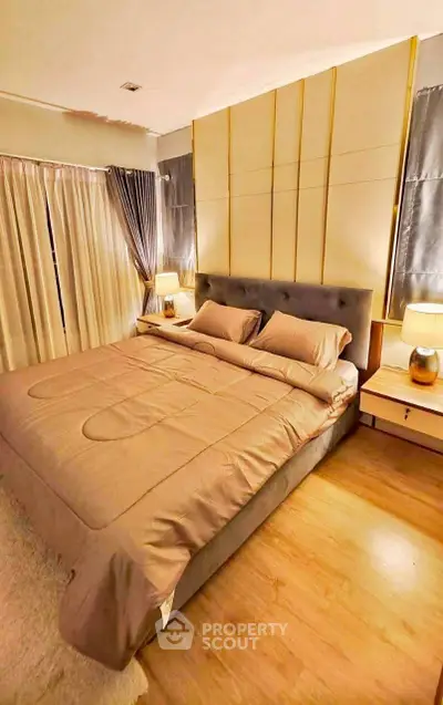 Luxurious bedroom with elegant decor and ambient lighting for a cozy retreat.