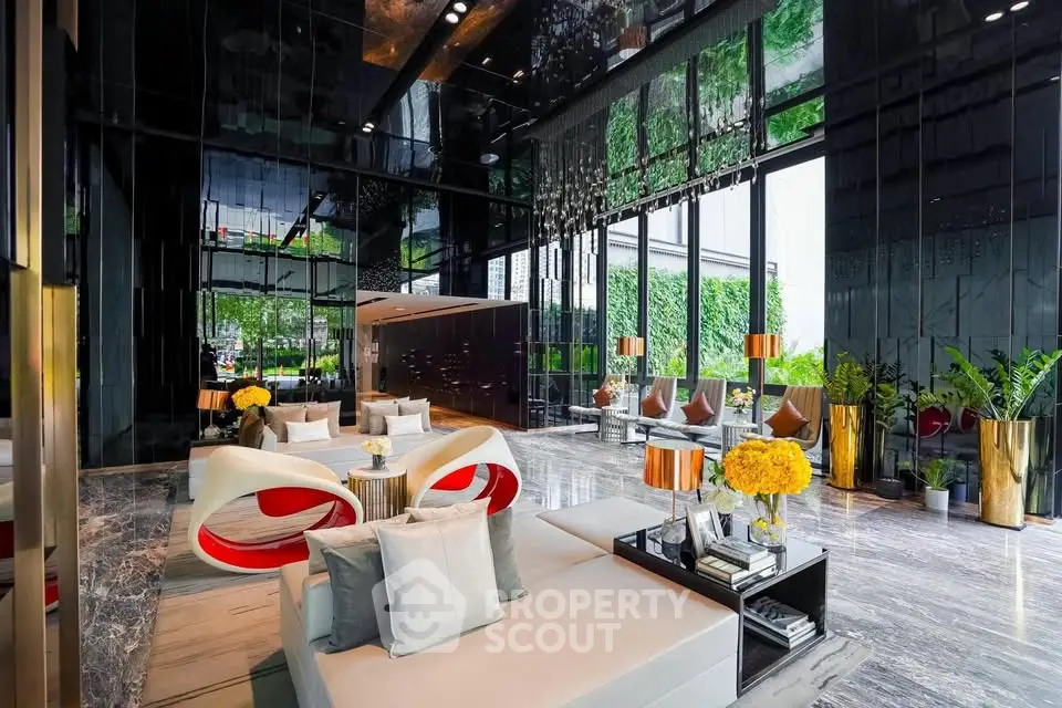Luxurious modern lobby with sleek design and vibrant decor in upscale building.