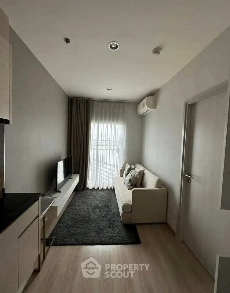 Modern living room with sleek design and natural light