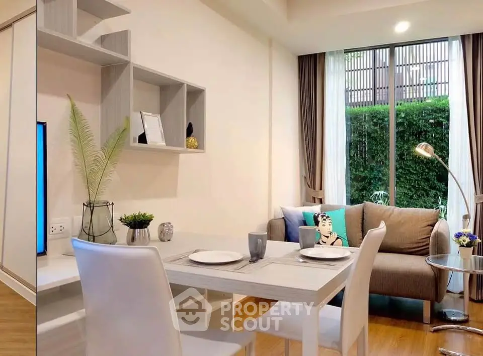 Modern living room with stylish decor and large window view