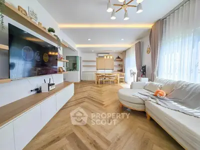 Spacious modern living room with elegant decor and natural light