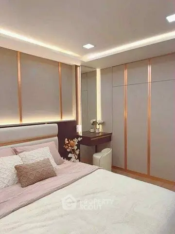 Luxurious modern bedroom with elegant lighting and stylish decor