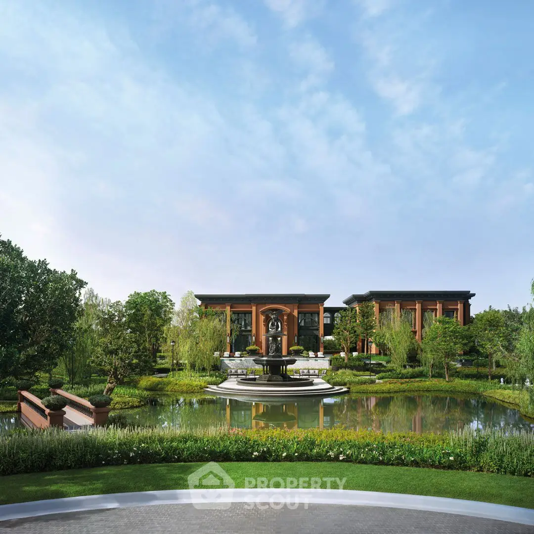 Luxurious estate with serene pond and lush landscaping