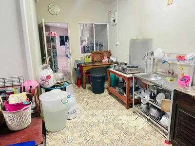 Spacious kitchen with open layout and ample storage space