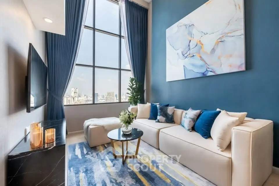 Luxurious high-ceiling living room with modern decor and stunning city view.