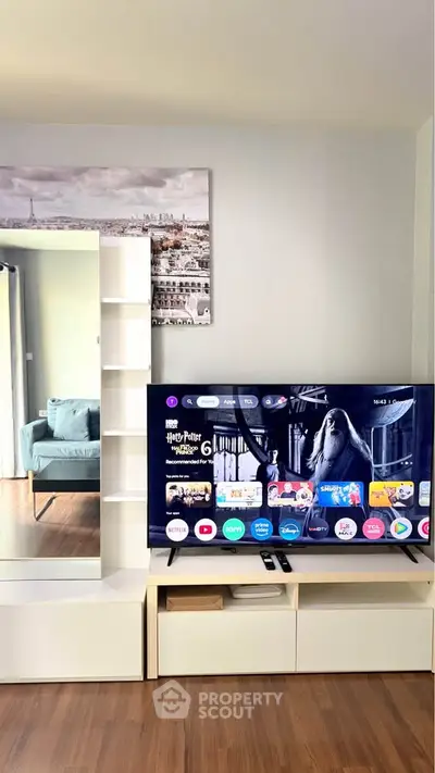 Modern living room with sleek TV setup and stylish decor
