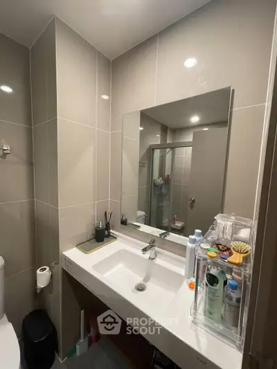 Modern bathroom with sleek design and ample storage space