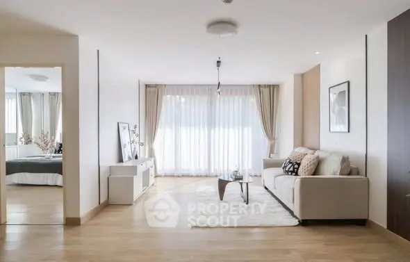 Spacious modern living room with elegant decor and natural light