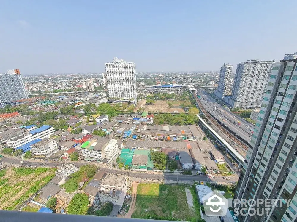 Stunning high-rise cityscape view from a modern apartment balcony