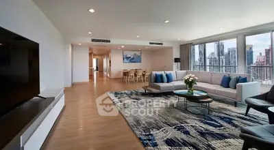 Spacious modern living room with city view and elegant decor