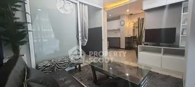 Stylish modern living room with glass coffee table and zebra-patterned bench