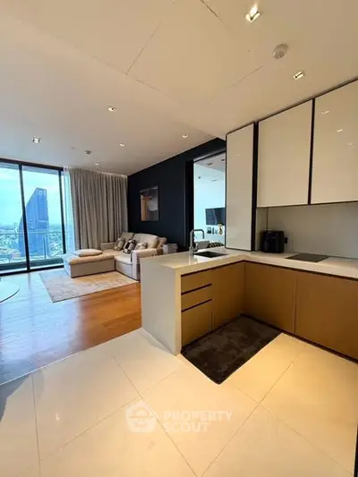 Modern open-plan living room with city view and stylish kitchen