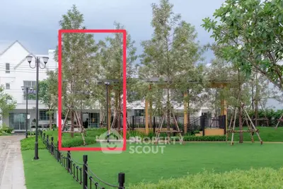 Beautiful garden with lush greenery and modern landscaping in a residential area.