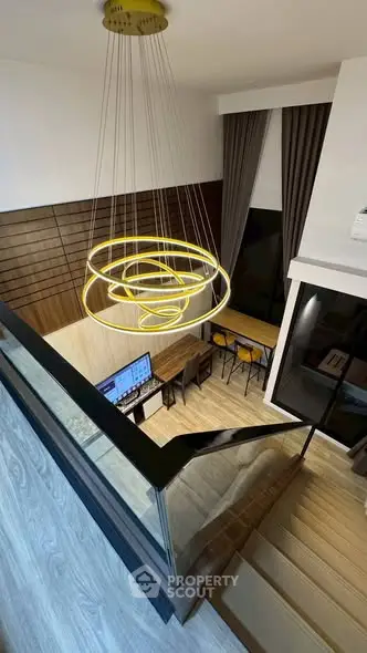 Modern duplex interior with stylish lighting and open layout