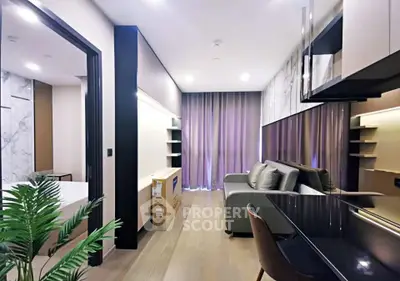 Modern living room with sleek design and elegant furnishings in a contemporary apartment.