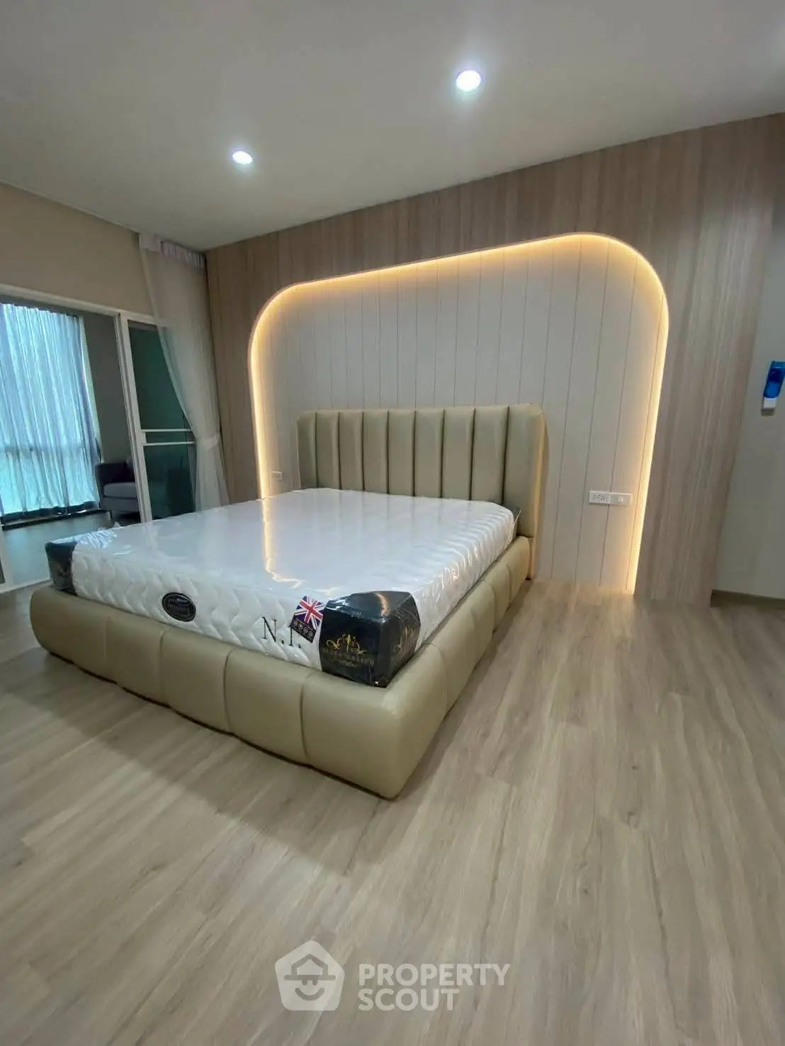 Luxurious bedroom with modern lighting and elegant bed design