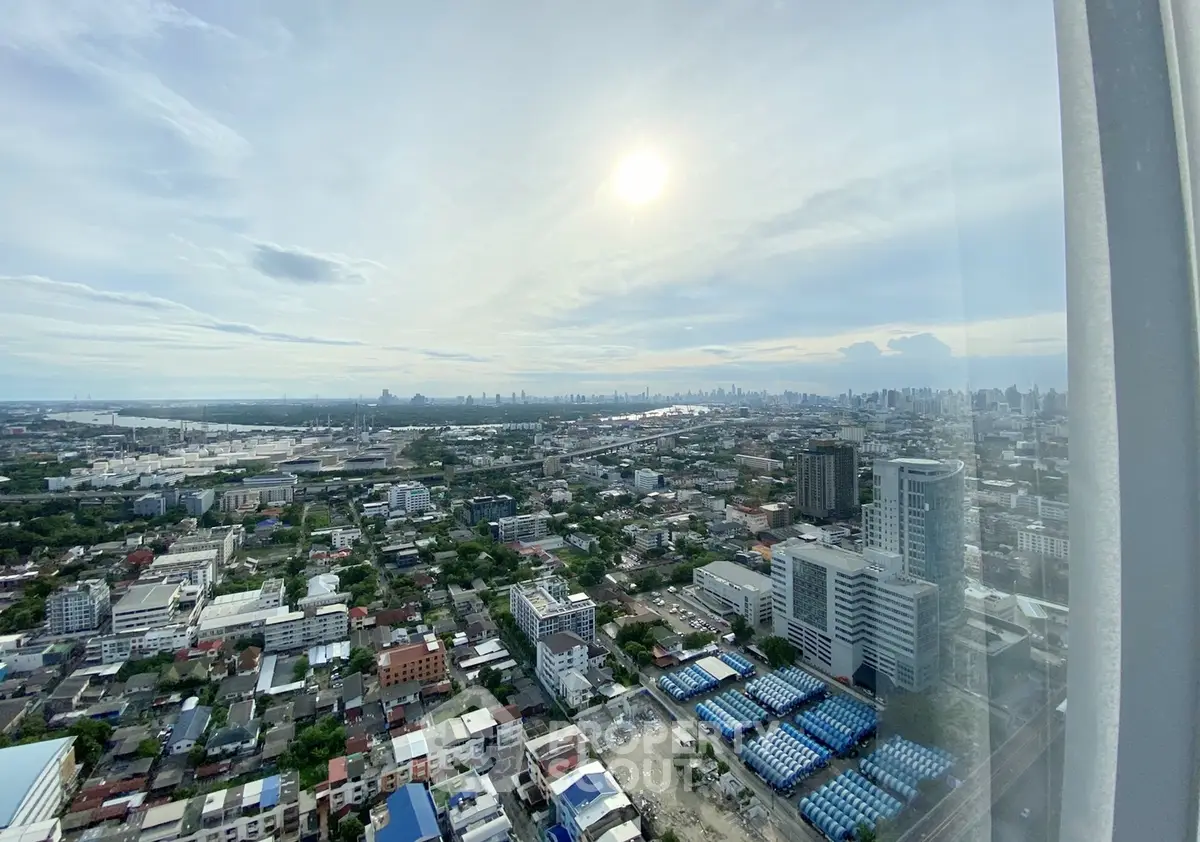 Stunning cityscape view from high-rise building with expansive skyline and urban landscape.