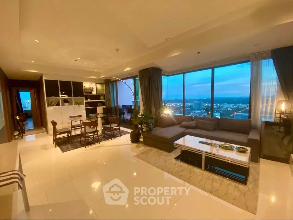 Luxurious living room with panoramic city view and elegant decor