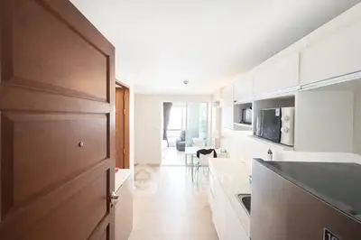 Modern open-layout kitchen with dining area and living room view