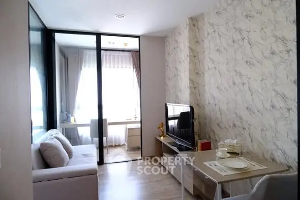 Modern living room with stylish decor and natural light