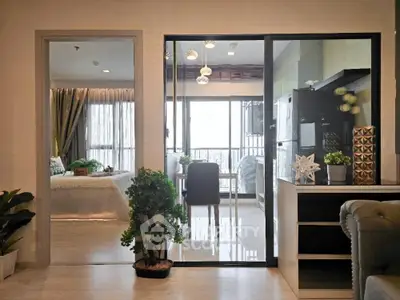 Modern open-plan living space with stylish decor and natural light