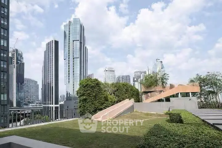 Stunning cityscape view from a modern rooftop garden with lush greenery and urban skyline.