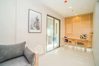 Modern living room with minimalist decor and natural light