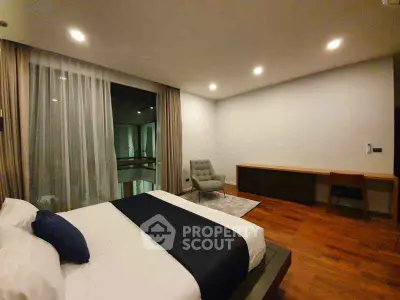 Luxurious modern bedroom with elegant decor and wooden flooring