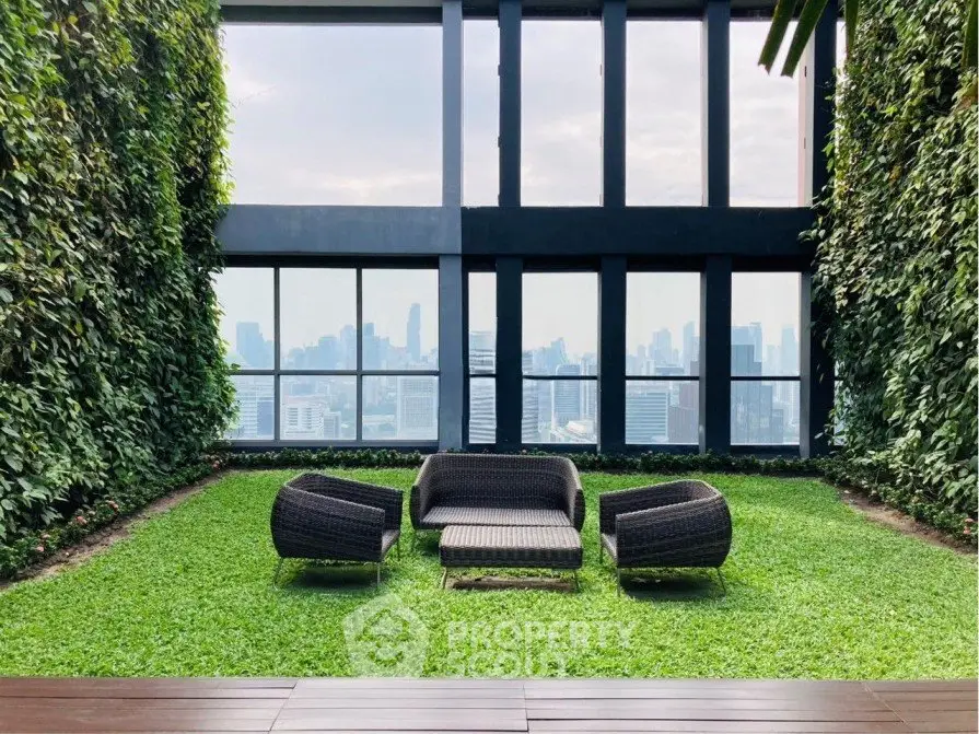 Luxurious rooftop garden with stunning city view and modern outdoor seating.