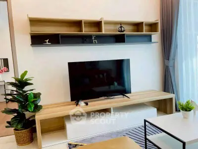 Modern living room with stylish TV unit and elegant decor