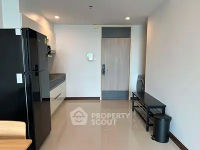 Modern kitchen with sleek appliances and minimalist design, perfect for urban living.