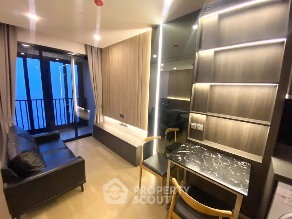 Modern living room with sleek design and balcony view