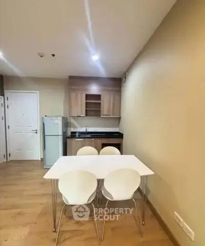 Modern kitchen with dining area in a cozy apartment