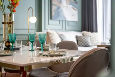 Luxurious dining area with elegant decor and modern furnishings in a stylish apartment.
