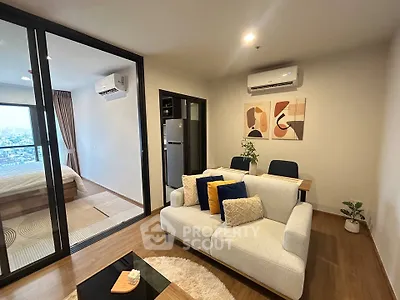 Modern living room with open layout and balcony view
