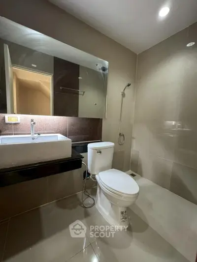 Modern bathroom with sleek fixtures and spacious design