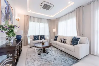 Elegant living room with stylish decor and natural light