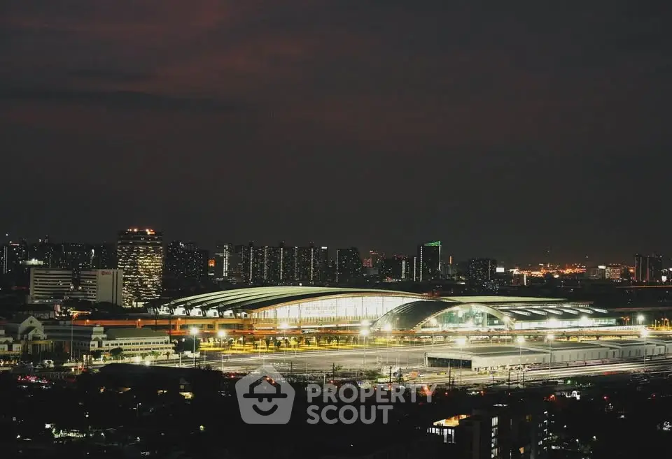 Stunning night view of a modern urban building complex with city skyline