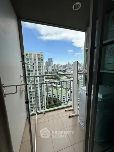 Charming balcony with stunning cityscape view, perfect for urban living enthusiasts.