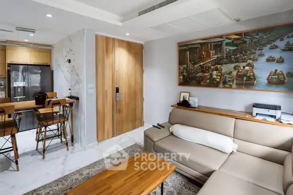 Modern living room with open kitchen and stylish decor