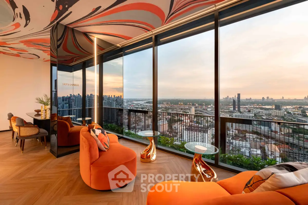 Luxurious living room with panoramic city views and modern orange decor